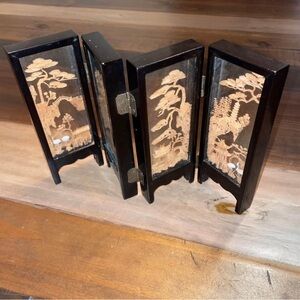 Intricate Oriental Wooden Garden Contained Within Black Walls